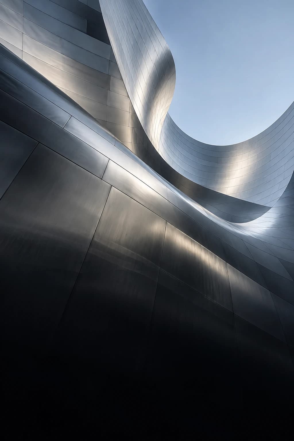 Flowing sculptural silver architecture